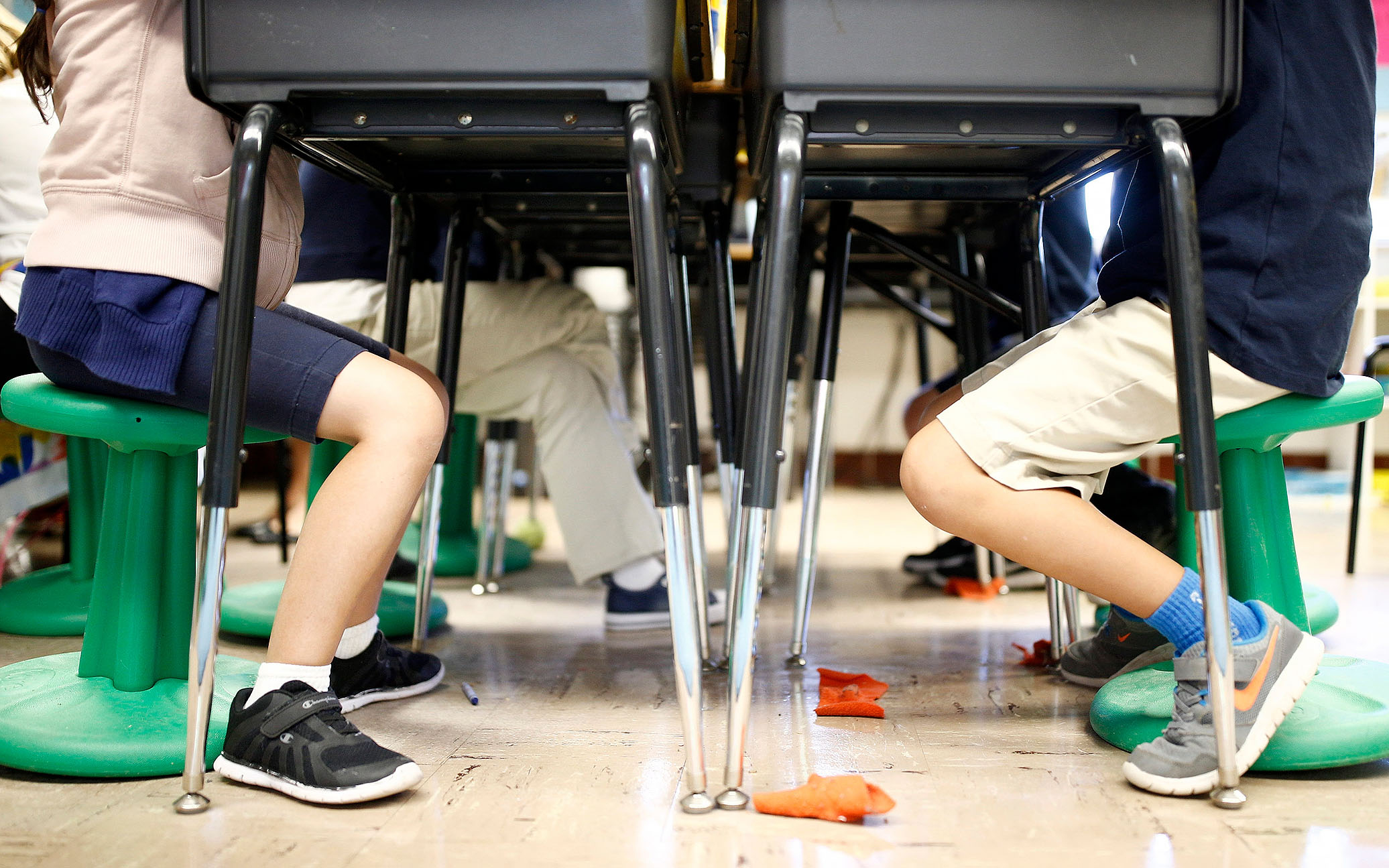 students sitting at classroom desks