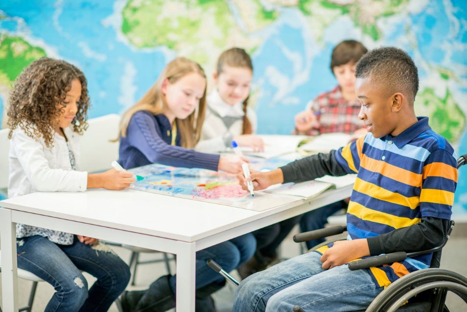 group of children working at a table